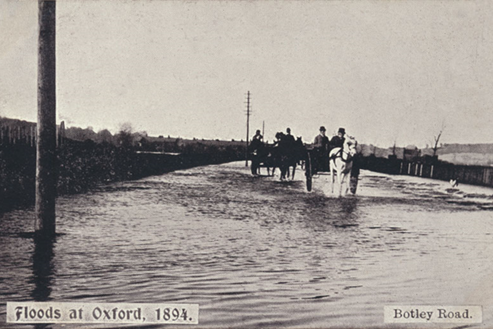 Botley Road in Oxford 1894 flooded with horse drawn carts making their way through the flood waters