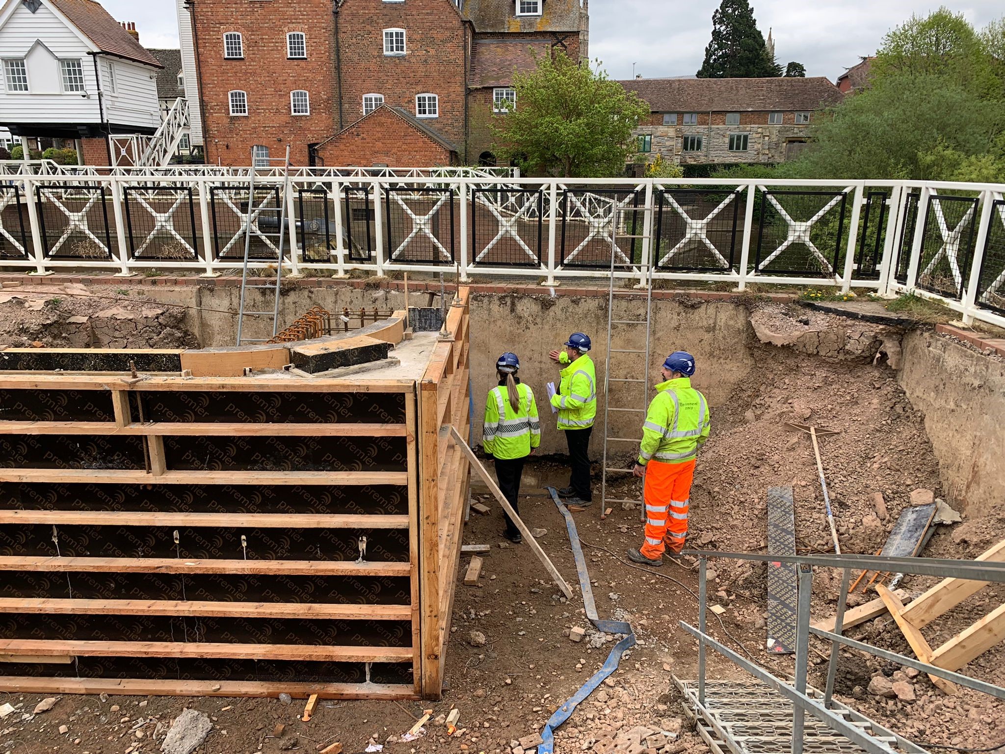 EA staff inspecting progress with the eel pass constructions