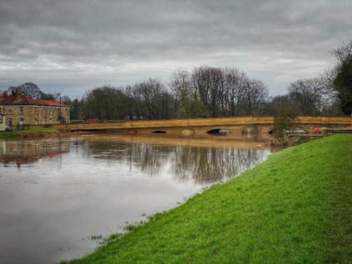High river levels at the repaired Tadcaster road bridge, March 2020